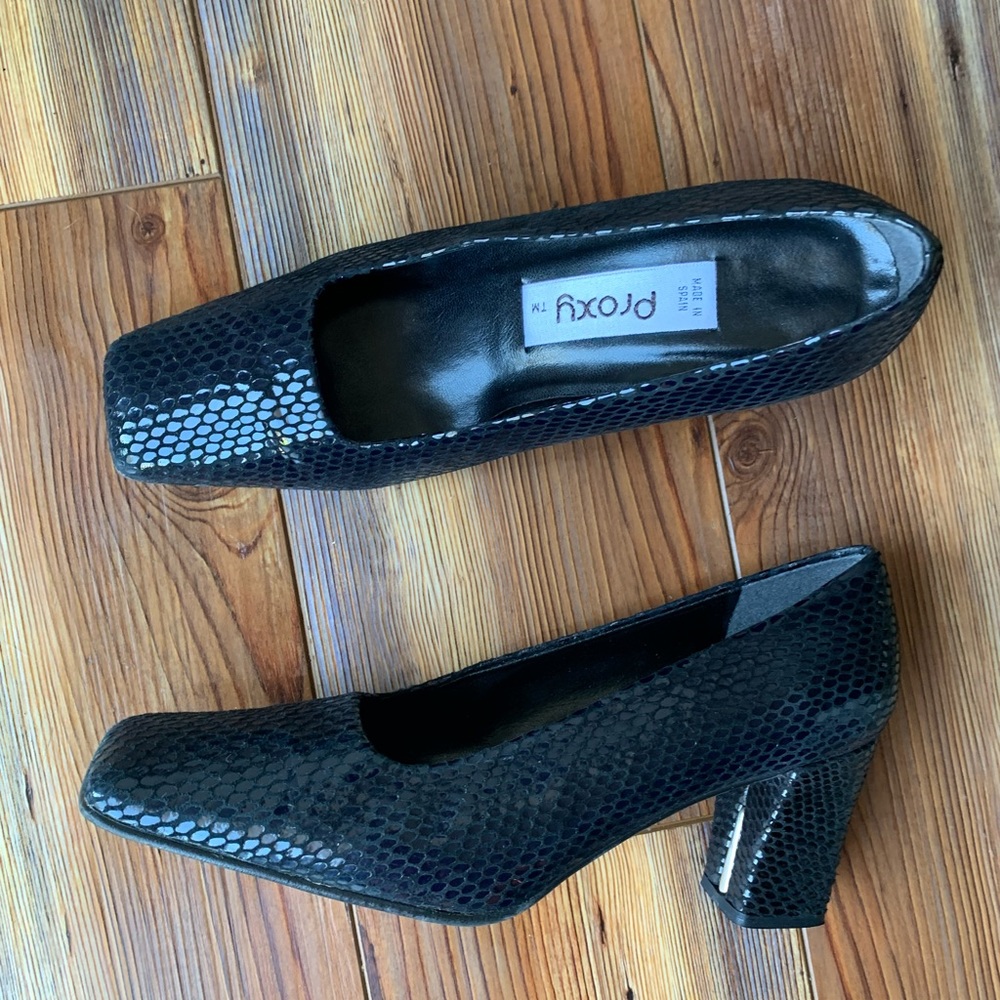 Proxy made in Spain black square toe block heel slip on faux crocodile heels.